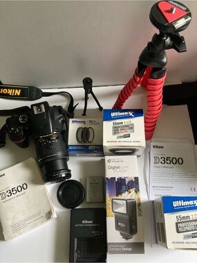 Nikon DSLR Camera Kit with Black Body and Red Tripod